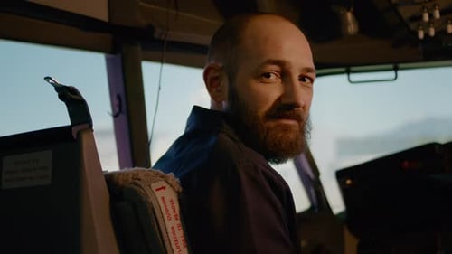 Portrait of Aviation Captain Using Control Panel Command to Takeoff