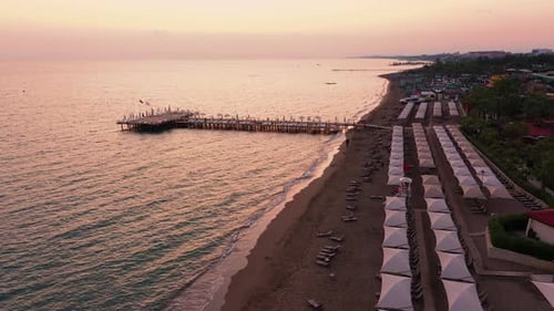 Arial View To Luxury Resort and Coastline at Sunset