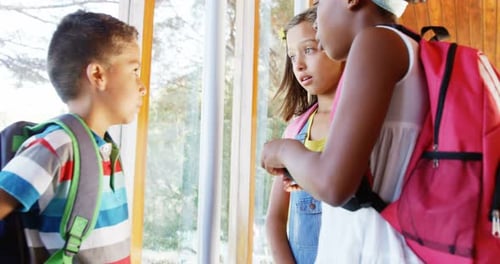 School kids interacting with each other
