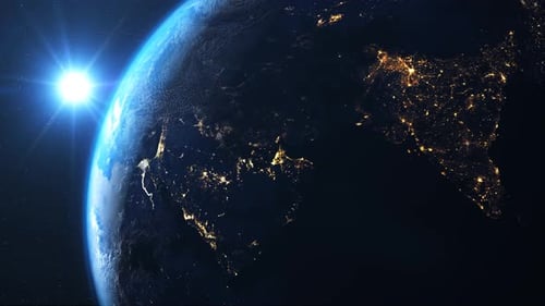 Planet Earth Rotating with Glowing City Lights in Space