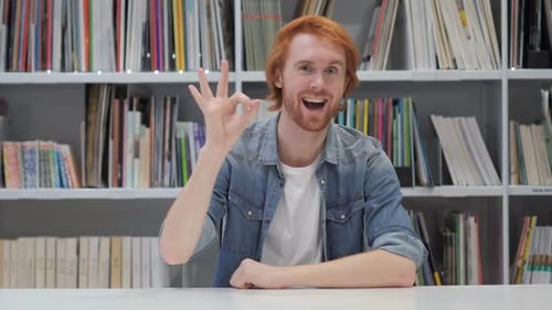 Red Haired Man Gives Okay Gesture