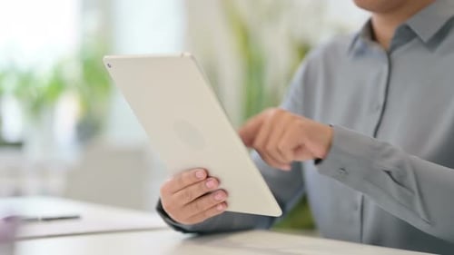Close Up of African Woman Using Digital Tablet