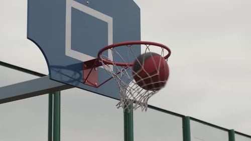 Scoring Shot on Outdoor Basketball Court
