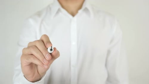 Man Writes Promotion on Clear Surface