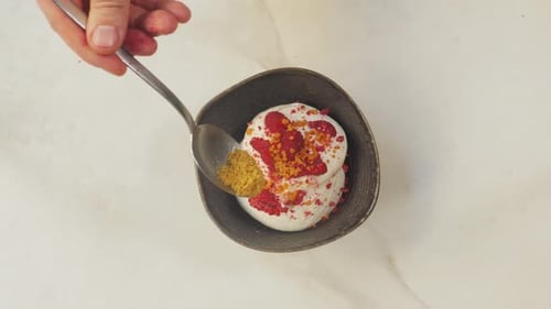 Preparing Dessert Topping with Zest and Crumble