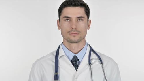 Serious Doctor with Stethoscope Close Up