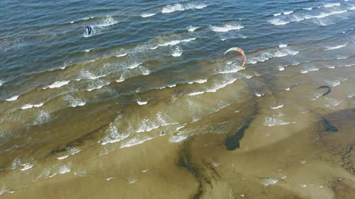 Aerial Shot of Kiteboarders and Kitesurfers of the Baltic Sea Latvia