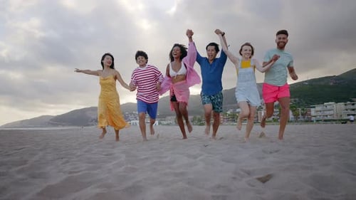 Group of friends having fun on the beach.