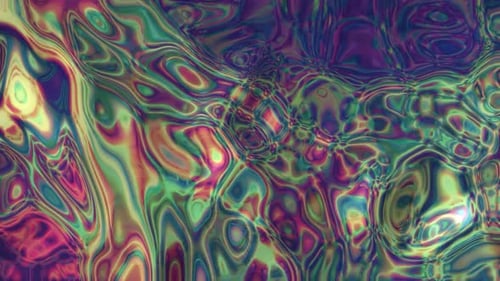 A chemical reaction with ink mixture creating colorful surreal shapes