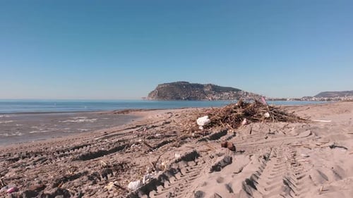Dirty beach of Alanya city after powerful storm