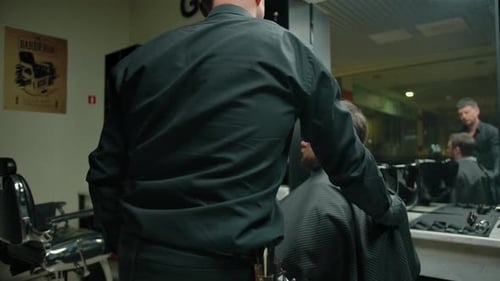 Man Getting Haircut at Upscale Barbershop