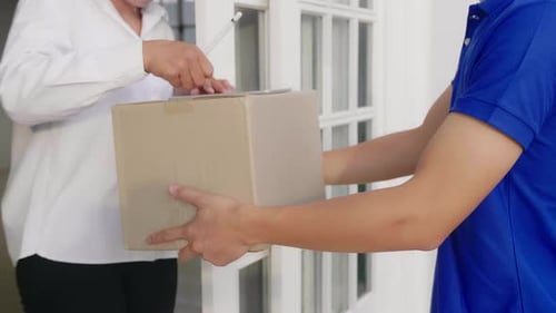 Courier Delivering Package to Home, Signing Tablet