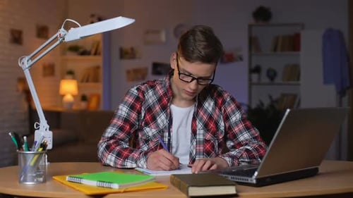 Tired Young Student Preparing for Exams, Feeling Exhausted, Lack of Energy