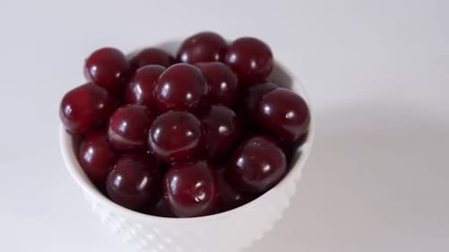 Bowl of Fresh Red Cherries Rotating