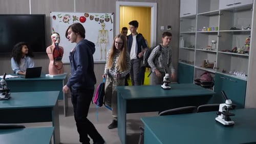 High School Students Entering Science Classroom