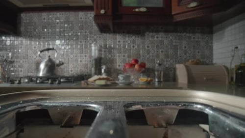 Bread Toasting Inside Toaster in Kitchen