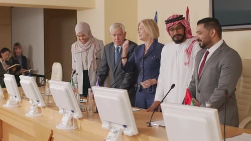 Businesspeople at International Corporate Conference Indoors