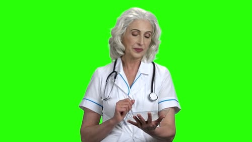 Female Doctor Using Futuristic Digital Tablet