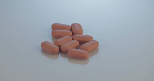 Tan Pills Rotating