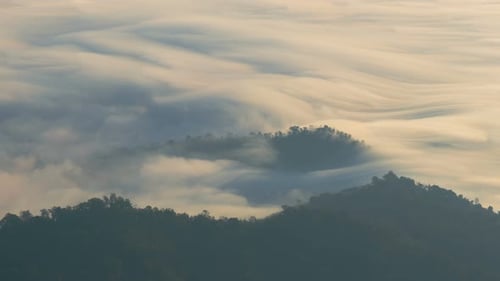 Fog Moving Along Mountain Peak