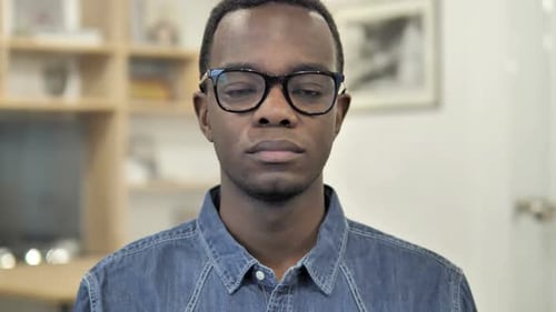 Close Up of Young Adult in Glasses