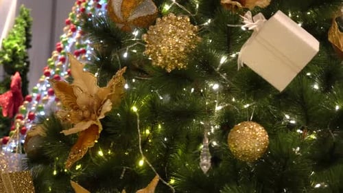 Christmas Tree Decorated with Flowers and Ornaments