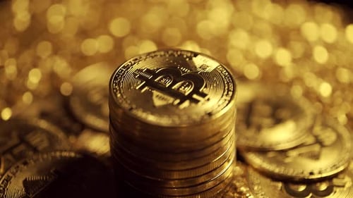 Shiny Golden Bitcoin Cryptocurrency Coins Stacked Close Up