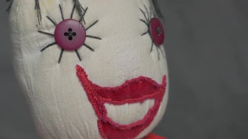 Handmade artificial joker doll made of cotton fabric slow panning 4K 2160p UltraHD footage - Jester