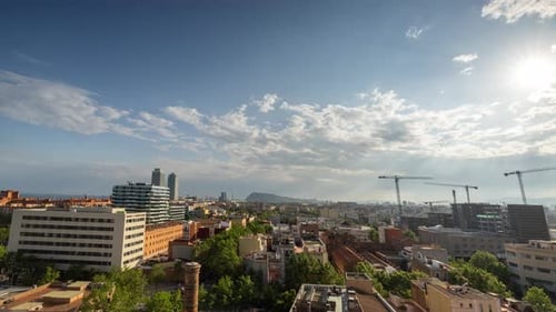 Barcelona Skyline Timelapse with Passing Clouds