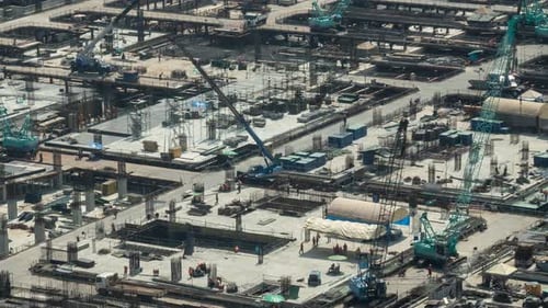 Time Lapse of Construction Site with Heavy Construction Machinery in Metropolis