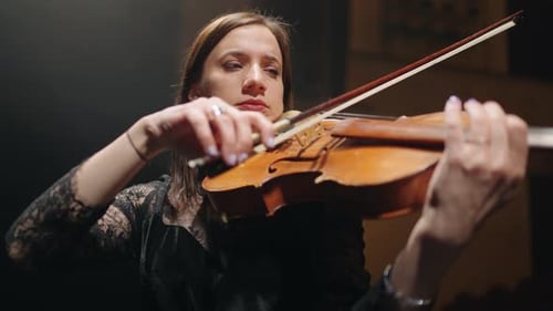 Woman is Playing Violin on Scene of Philharmonic Hall Portrait of Talented Woman Musician