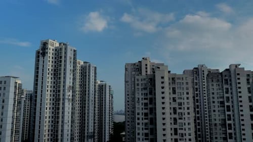 Cloud Pass Over Top of Apartment Building