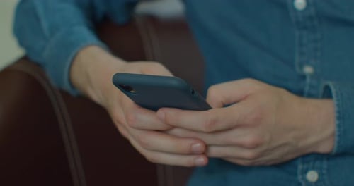 Hands of Young Man Using Smartphone at Home Office. Communication, Online Shopping, Chat, Social