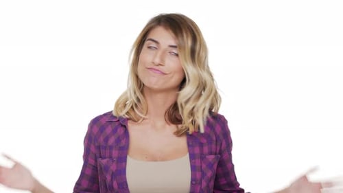 Woman with Blonde Hair Smooths Hair, Says No