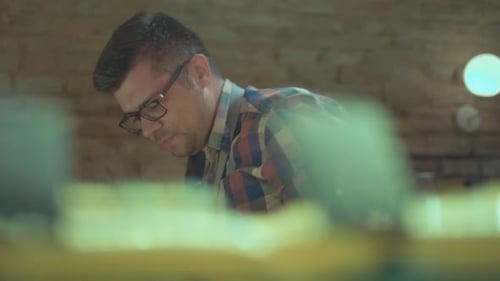 A Male Baker Is Kneading Dough and Making Bread with a Rolling pin.Cooking Process, Culinary, recipe