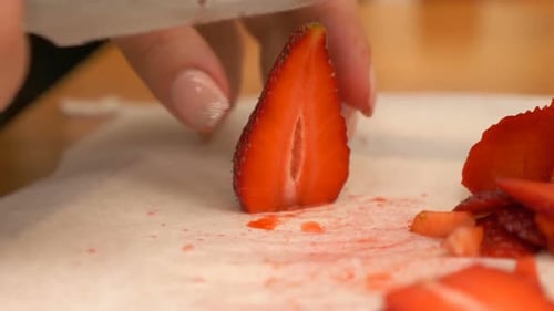 Strawberry Sliced on a Cutting Board