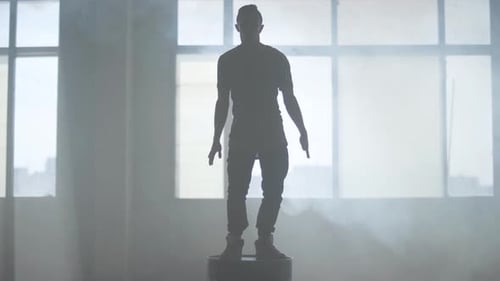 Cool Street Dancer Hip-hop Dancing on a Barrel in an Abandoned Building