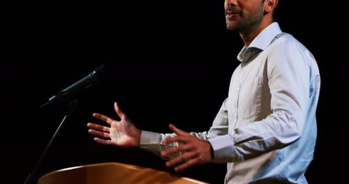 Engaging Young Adult Speaker at a Podium