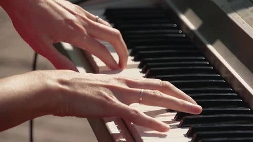Fingers Playing Electronic Keyboard Instrument Close Up