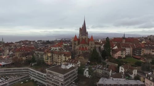 Aerial of buildings around Lausanne Cathedral