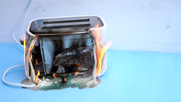 Burning Toaster Emitting Flames and Smoke, Buildings Stock Footage ft ...