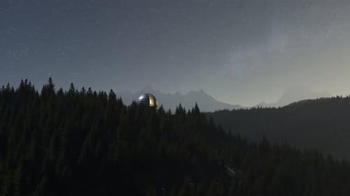A modern astronomical observatory in a vast coniferous forest during night. 4KHD