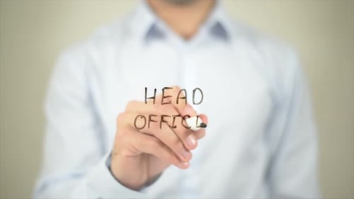 Head Office Man Writing on Transparent Screen