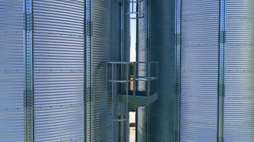 Metal elevator in agriculture zone. Grain Warehouse or depository.
