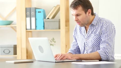 Man at Work Gesturing Business Loss