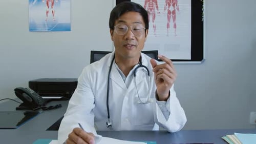 Medical Professional Speaking to Camera in Bright Office