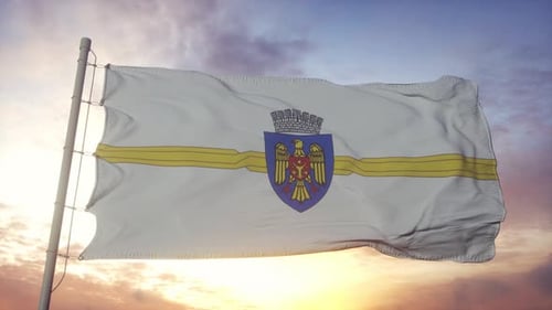 Bandeira de Chisinau, capital da República da Moldávia, ondulando no vento, no céu e no fundo do sol