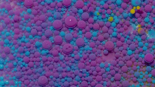 Colorful Paint Bubbles in Liquid Close Up