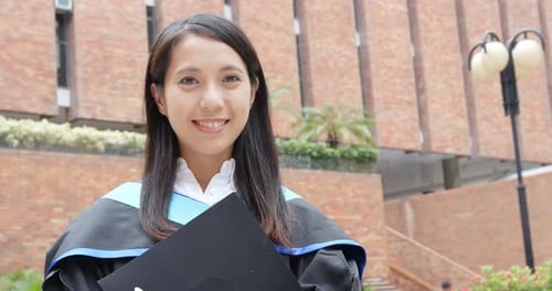 Confident woman get graduated in university