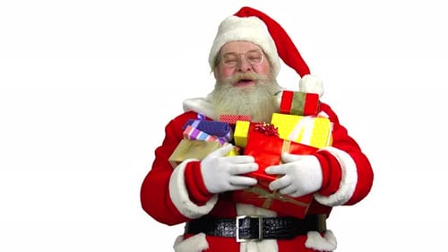 Cheerful Adult Holding Colorful Christmas Gifts